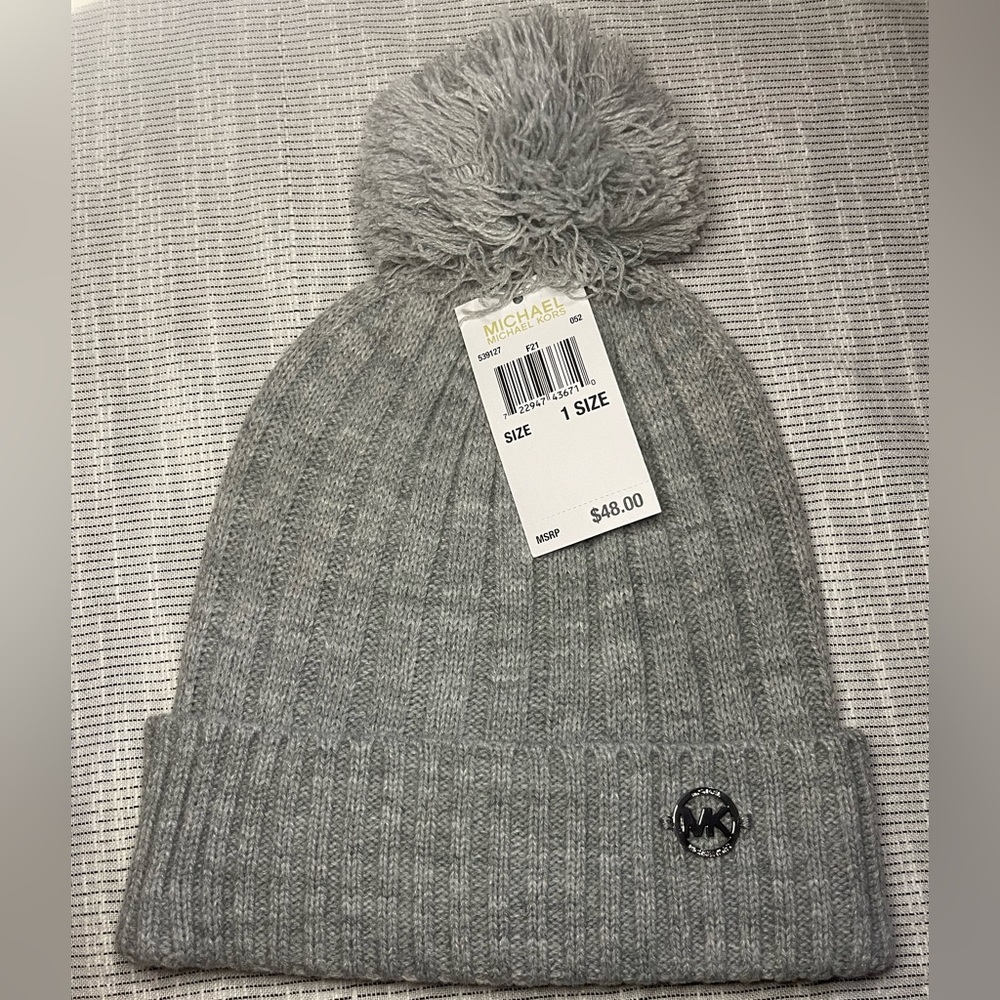 NWT! Michael Kors - Light gray pom-pom knit hat. One size fits all